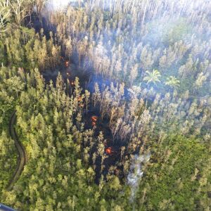 Lava is shown burning in Leilani Estates subdivision near the town of Pahoa on Hawaii’s Big Island. | U.S. Geological Survey via AP