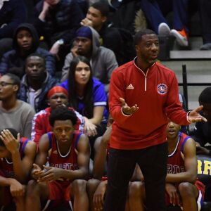Curie coach Mike Oliver tries to talk to the official. Worsom Robinson/For the Sun-Times.