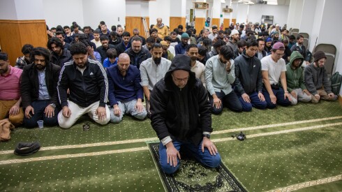 Mohamad Taisir Albik leads prayer to mark the end of the first day of Ramadan fasting at the Downtown Islamic Center of Chicago on Wednesday, Feb. 18, 2026.