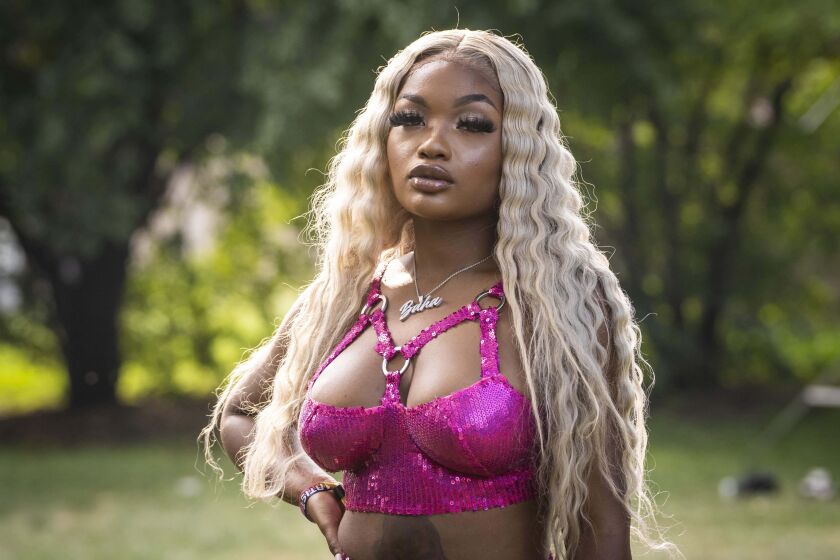 Chicago native Baha Bank$ poses for a portrait backstage after performing Friday afternoon on day one of the Summer Smash Festival in Douglass Park.