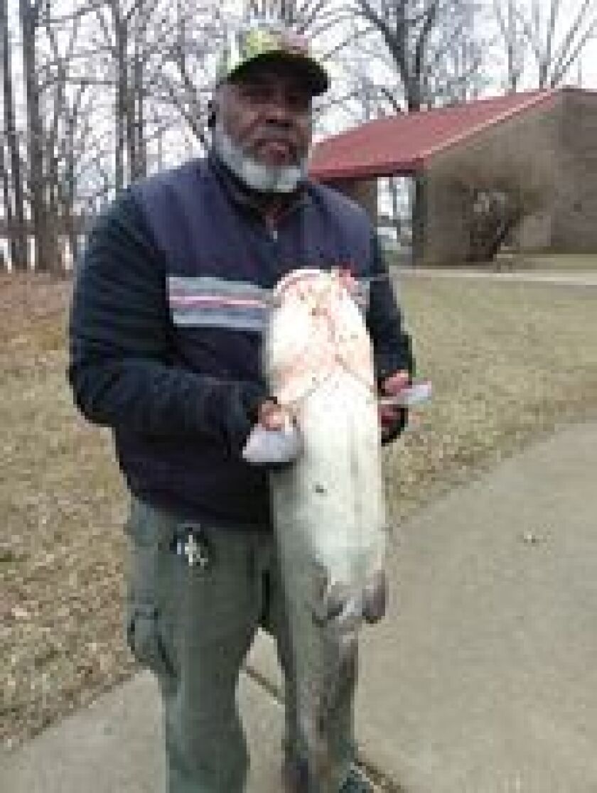 Thomas Jones and a big blue catfish from Clinton Lake. Provided photo