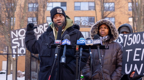 Darren Hightower speaks at a press conference.