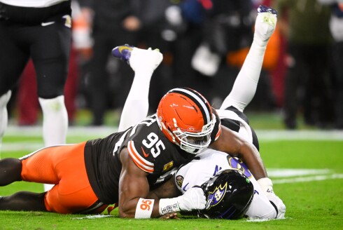 Cleveland Browns defensive end Myles Garrett sacks Baltimore Ravens' Lamar Jackson in Cleveland on Sunday, Nov. 16, 2025.