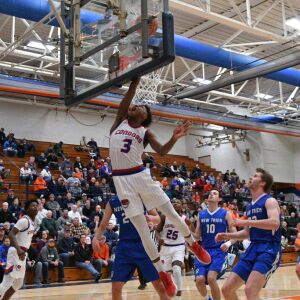 Curie’s DaJuan Gordon (3) (3) gets a lay up off the backboard, Friday 12-28-18. Worsom Robinson/For Sun-Times