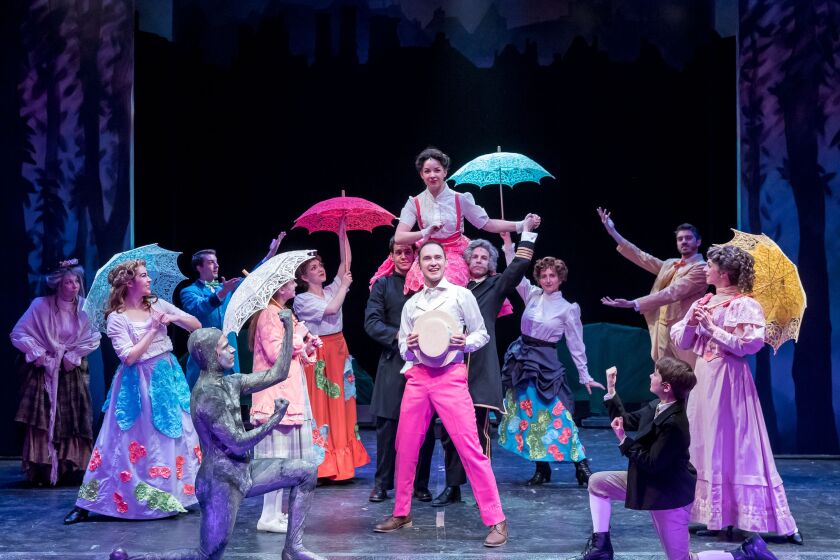 The cast of the Mercury Theater Chicago production of “Mary Poppins” with Matt Crowle (center) as Bert and Nicole Armold (aloft) as the title character. (Photo: Brett A. Beiner)