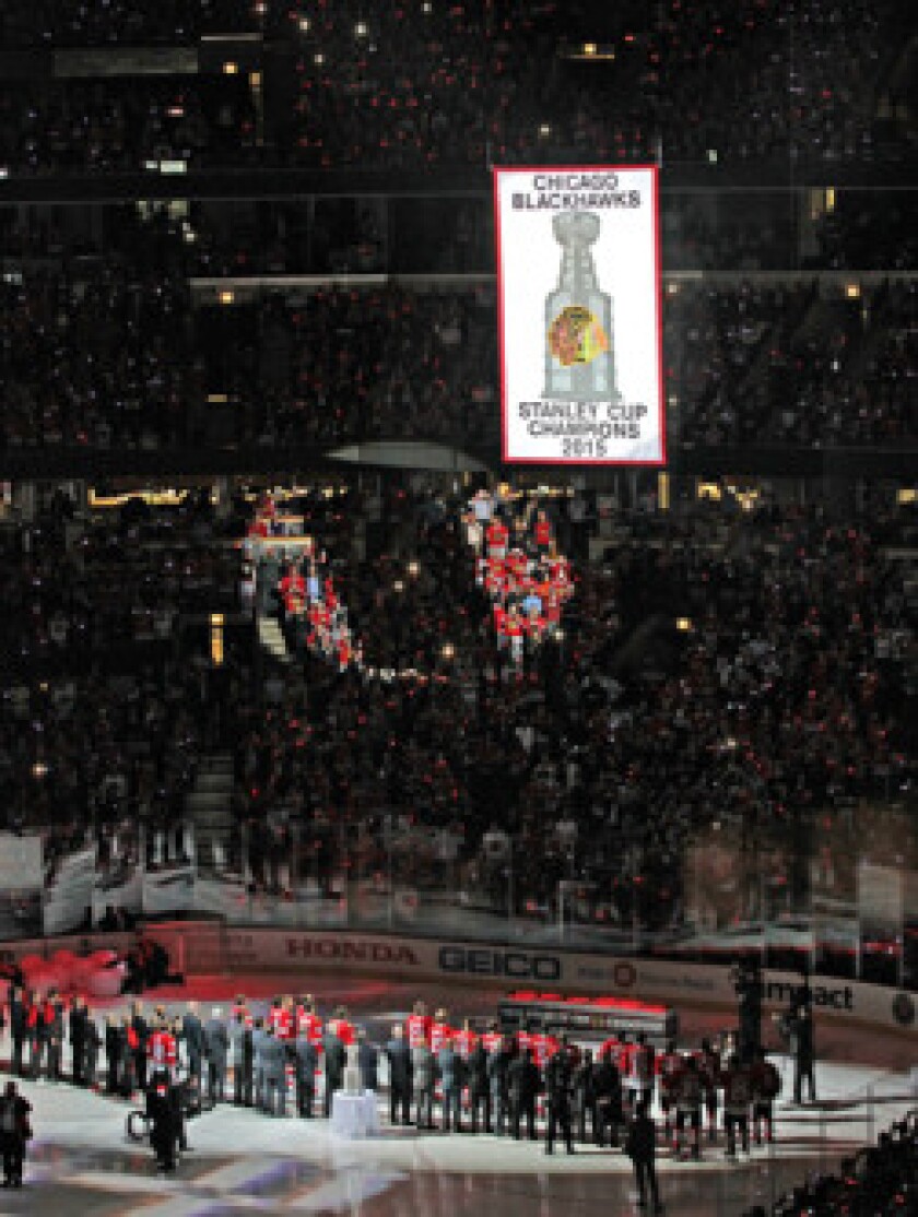 Raising the 2015 Stanley Cup Championship Banner at the United Center. | COPYRIGHT BLACKHAWKS PUBLISHING