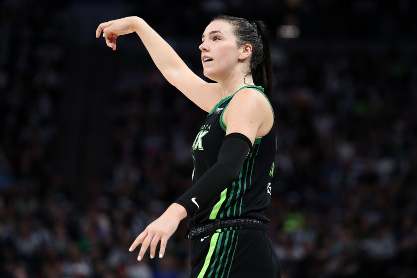 Minnesota Lynx forward Bridget Carleton reacts to a shot against the Phoenix Mercury during the second half of Game 2 of a playoff semifinals series on Tuesday, Sept. 23, 2025, in Minneapolis.