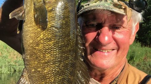 George Peters with a smallmouth bass from the Kankakee River. Provided photo