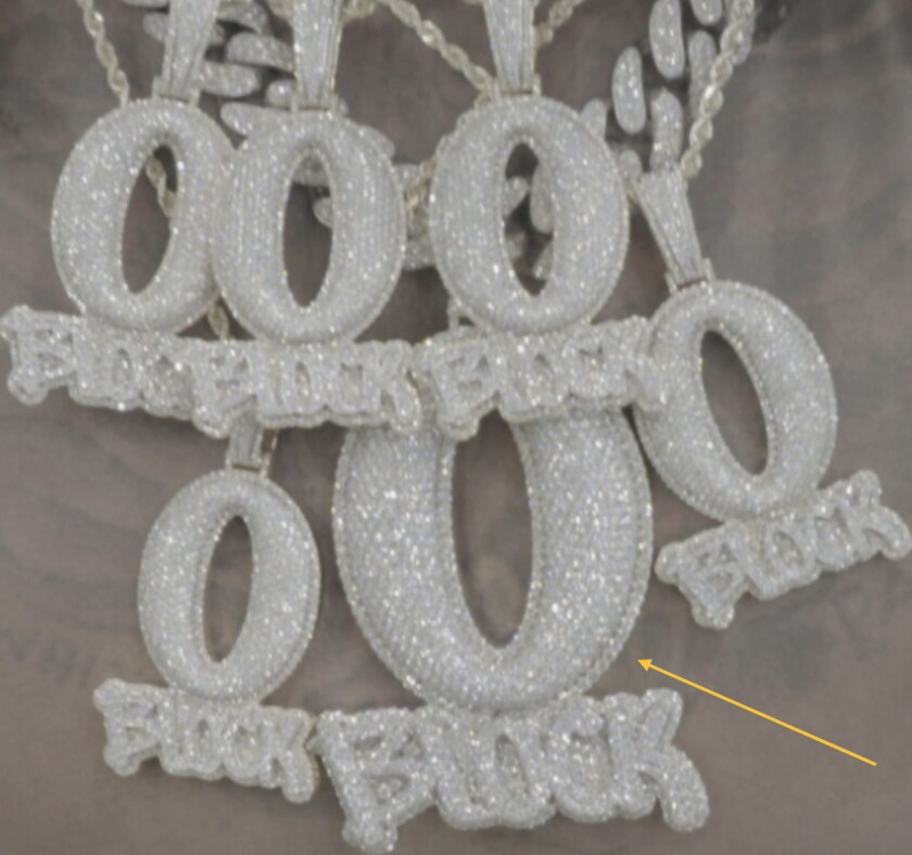 A cluster of Diamond O Block necklaces purchased by the late rapper King Von.
