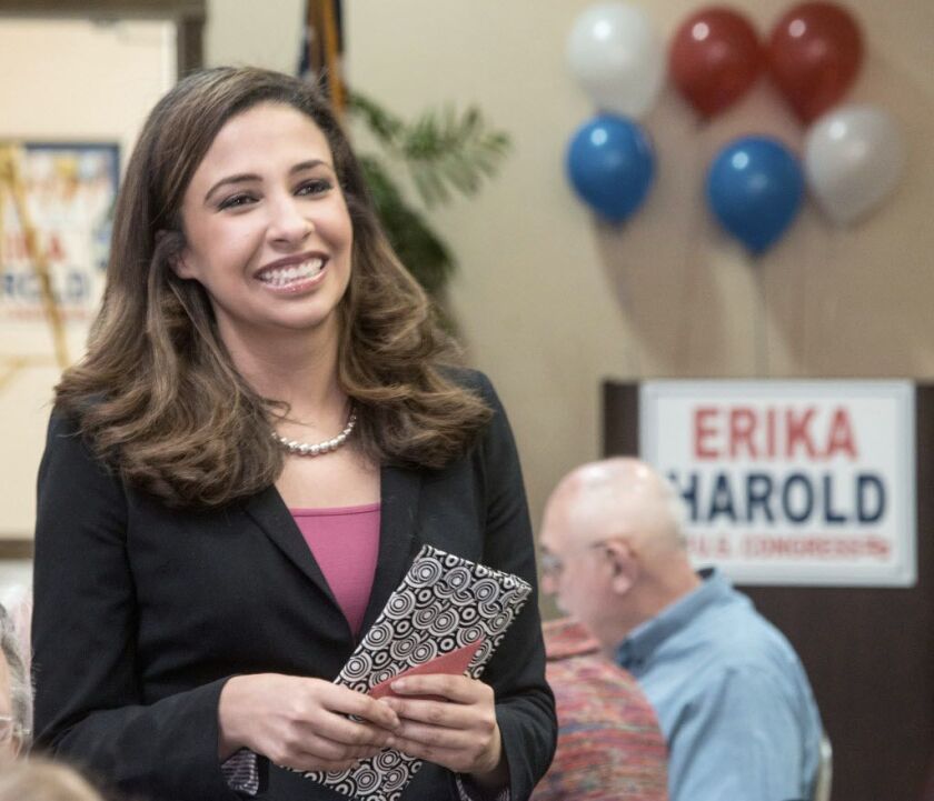 Erika Harold, then-Republican primary candidate for the 13th Congressional District of Illinois, talks to supporters in Champaign, in 2014. File Photo. (John Dixon/The News-Gazette via AP)
