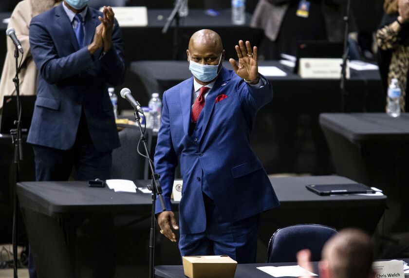 State House Speaker Emanuel “Chris” Welch, D-Hillside, waves as he gets a standing ovation after being elected to the chamber’s top leadership post in January.