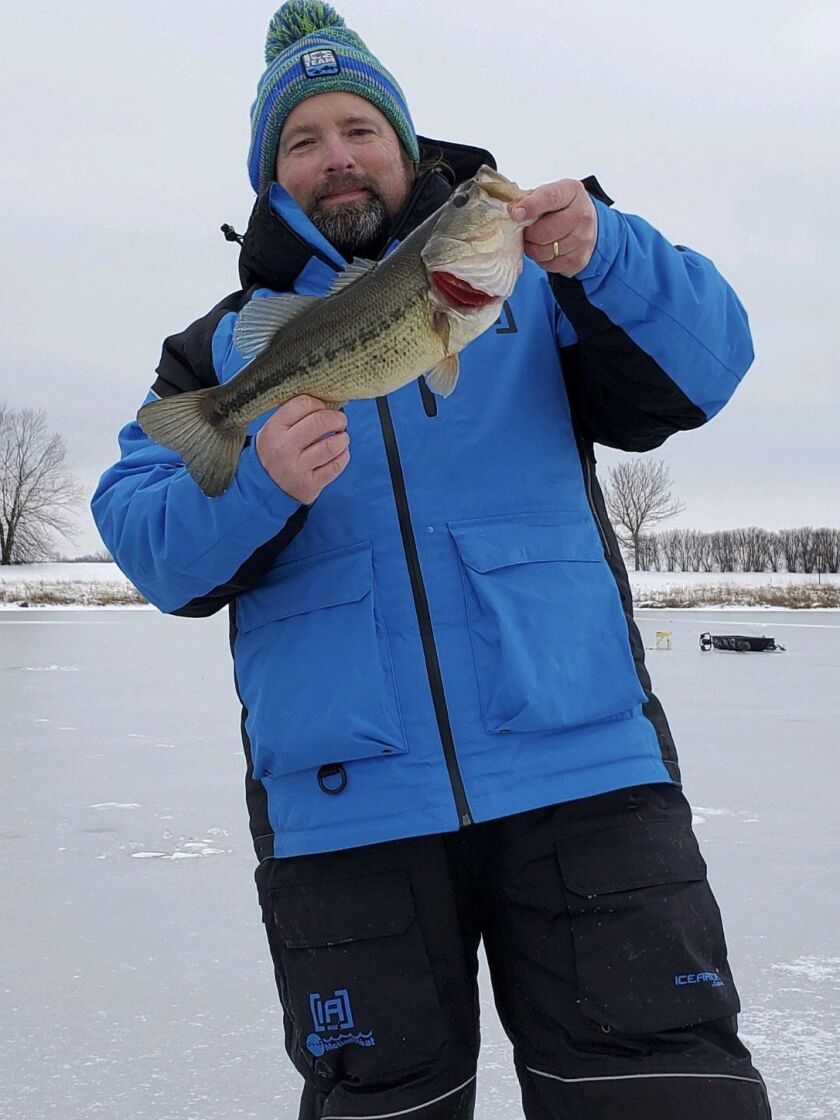 Ken “Husker” O’Malley with a local pond largemouth bass. Provided photo