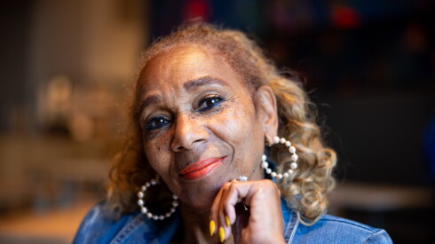 Color Me Coffee founder Rhonda Stivers sits at the Mahalia Jackson Cafe at the Obama Presidential Center.