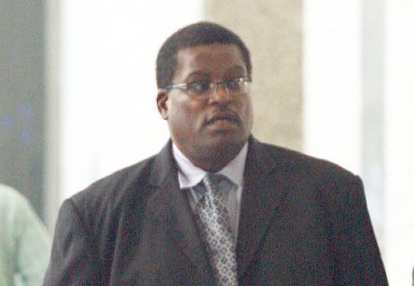 Former Chicago Police Sgt. Ronald Watts leaves the Dirksen Federal Building on Oct. 9, 2013, after receiving a 22-month sentence after being found guilty for his role in an FBI sting operation. | Sun-Times file photo