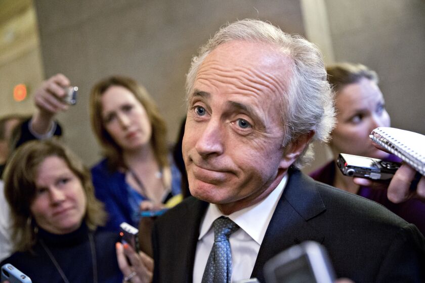U.S. Sen. Bob Corker, R-Tenn., speaks to reporters on Capitol Hill in Washington in October 2013. On Wednesday, he removed himself from consideration as Donald Trump’s running mate. | J. Scott Applewhite/AP