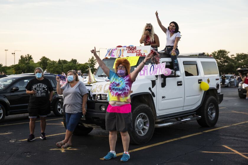 Fans gather at Soldier Field for Drive ‘N Drag presented by Voss Events, Friday night, Aug. 7, 2020.