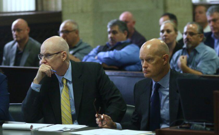 Assistant special prosecutor Joe Cullen, left, and special prosecutor Joe McMahon listen during a pretrial hearing for Chicago police Officer Jason Van Dyke at the Leighton Criminal Court Building Saturday, Sept. 1, 2018, in Chicago. | John J. Kim/Chicago
