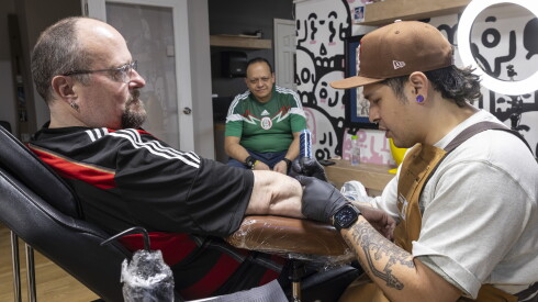 Steven Bruehl gets a tattoo at the Tattoo Art Collective from artist Orlando Camacho.