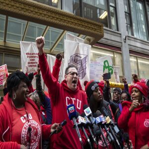 Chicago Teachers Union President Jesse Sharkey speaks during a rally outside Chicago Public Schools headquarters in the Loop, before marching through downtown with thousands of striking union members and their supporters, Thursday afternoon.