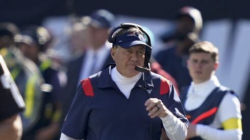 New England Patriots head coach Bill Belichick walks the sidelines during Sunday’s game against the New York Jets.