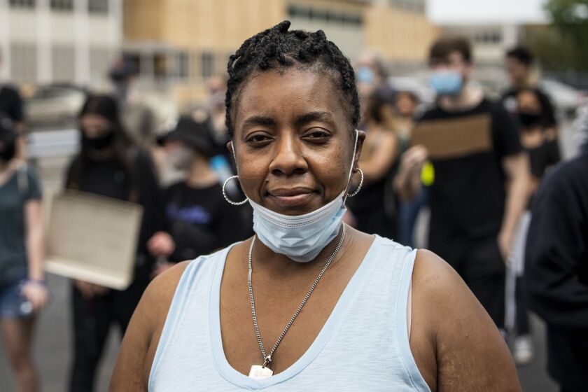 Kimberly Davis, who took part in a Black Lives Matter rally and march Thursday through her Southwest Side neighborhood.