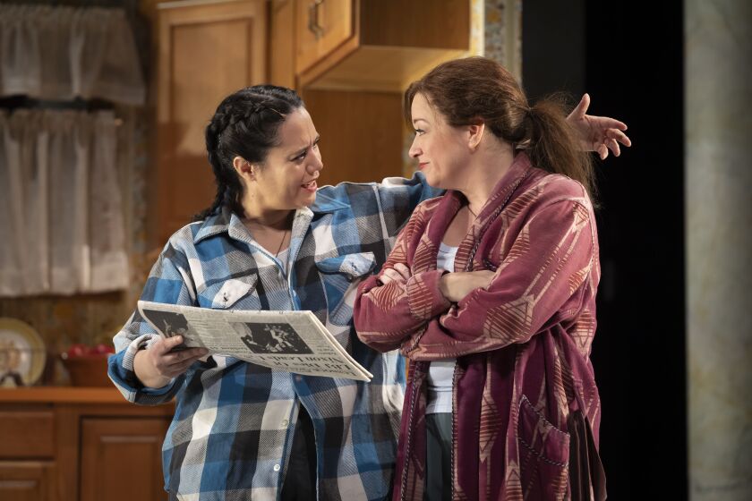Connie (Stephanie Diaz, left) is incredibly supportive — and patient — of her partner Norma (Kate Middleton) in the Goodman Theatre production of “Roe.”