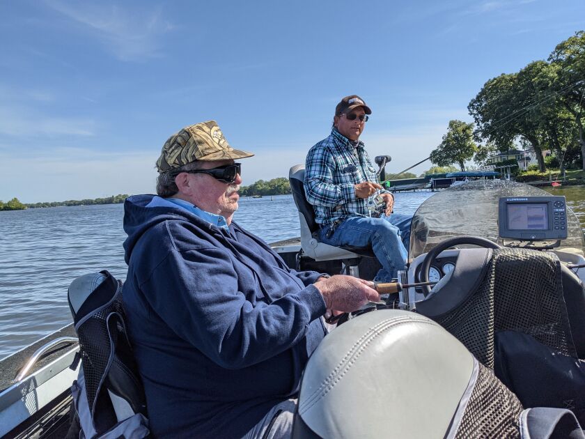 Mike Jackson and guide Phil Piscitello fishing on the Chain O’Lakes last week. Credit: Dale Bowman
