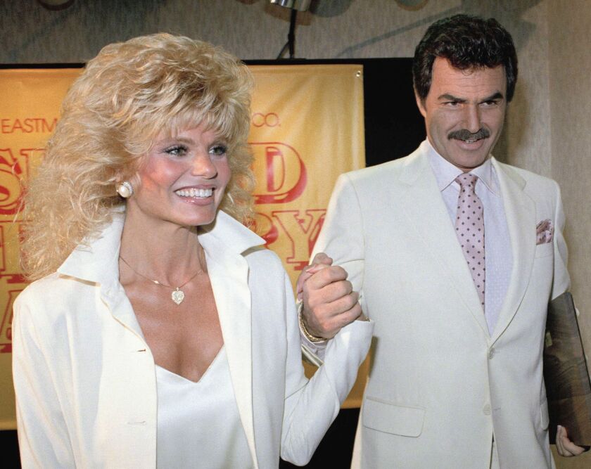 Loni Anderson and Burt Reynolds in 1987. | Bob Galbraith/AP