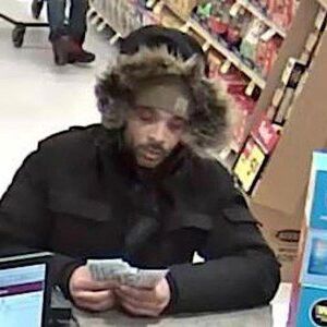 Surveillance photo of a man suspected of robbing the TCF Bank inside Jewel Osco in the 2500 block of Narragansett Ave. on Jan. 19, 2019. | FBI
