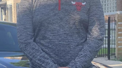 Benjamin Cortez-Gomez in front of his sister’s Dodge Charger. He was arrested after driving the car to Indiana in 2020 to buy guns.