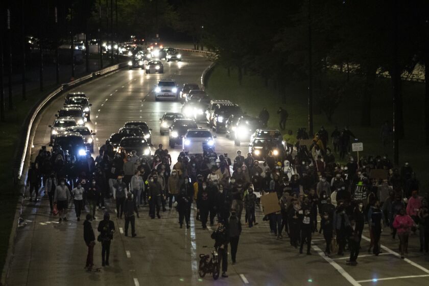 Protesters march on Lake Shore Drive near 47th Street on May 31, 2020, the third day of protests in Chicago over the death of George Floyd, who died in police custody on Memorial Day in Minneapolis.