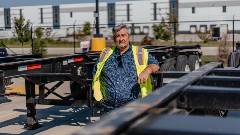 Bob Ilibasic in a parking lot in Joliet where some of his truck trailers are parked before drivers get them up so they can pick up loads from warehouses and nearby intermodal stations. He was friends with Ryan Hart, who was killed in 2020 when a semi rear-ended his camper at the height of morning rush hour. Ilibasic is terminal manager for American Marine Express, managing a fleet of truck drivers.