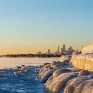Chicago’s lakefront is frozen over Friday morning as temperatures drop below zero, Friday, Jan. 25, 2019, in Chicago. | Tyler LaRiviere/Sun-Timesa