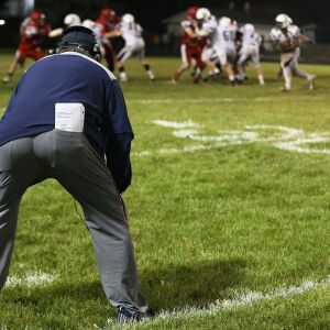 Lisle’s coach Paul Parpet leads the Lions to a victory over the Streator Bulldogs. | Allen Cunningham / for Chicago Sun-Times