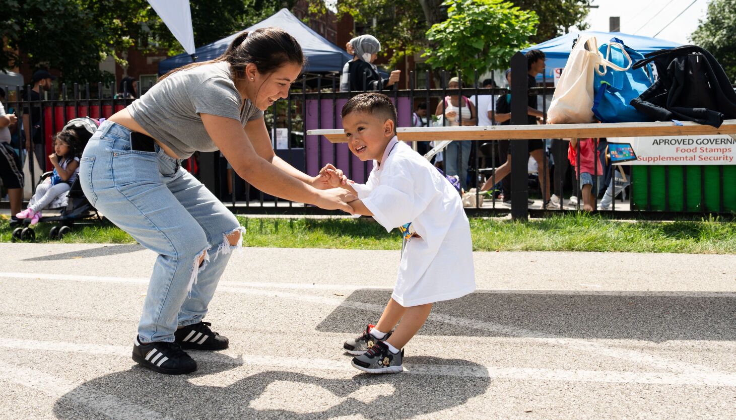 NextImg:Migrant children feel welcomed at CPS back-to-school bash