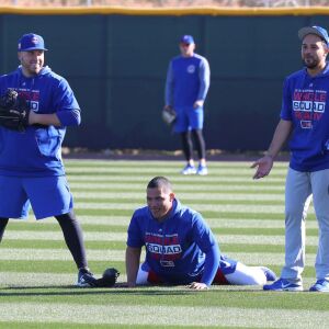 Victor Caratini (our left) and non-roster invitee Francisco Arcia (our right) surround Willson Contreras (bottom-middle) on Field 2 at Riverview Park, the Spring Training home of the Chicago Cubs, in Mesa, AZ. | John Antonoff/For the Sun-Times