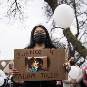 Ana Solano, 26, of Little Village, joins dozens for a vigil for 13-year-old Adam Toledo near the location of the shooting at West 24th Street and South Sawyer Avenue in Little Village, Monday afternoon, April 5, 2021. Toledo was fatally shot in the chest by a Chicago police officer in an alley west of the 2300 block of South Sawyer Avenue near Farragut Career Academy High School.