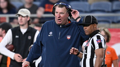 Illinois football coach Bret Bielema talks with an official during the Citrus Bowl against South Carolina on Dec. 31, 2024, in Orlando, Florida.