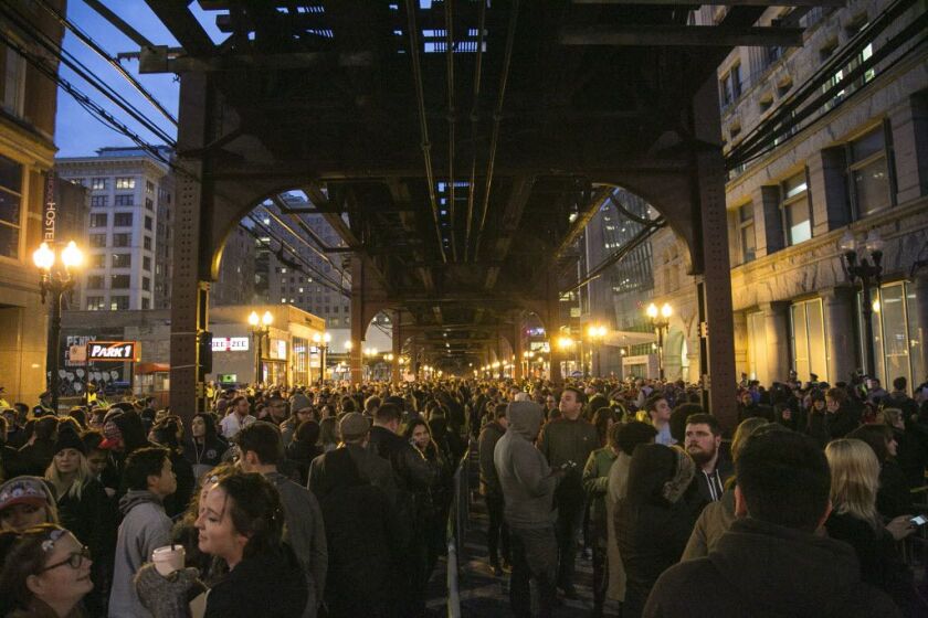 Thousands wait in line outside the Auditorium Theatre for Bernie Sanders’ “A Future to Believe In Chicago Rally,” on Monday night. | Ashlee Rezin/Sun-Times