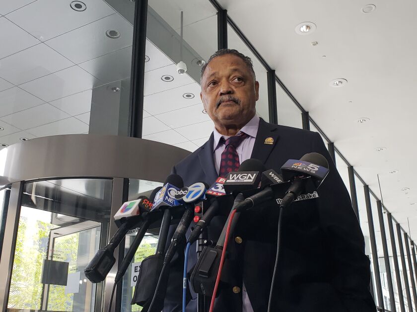 The Rev. Jesse Jackson talks to reporters after telling a federal judge that Chicago Police Officer Jason Van Dyke cannot be the fall guy for a failed justice system. | Nader Issa/Chicago Sun-Times