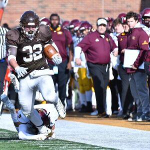 Joliet Catholic’s Nick Iannantone (32) runs for first down. Worsom Robinson/For the Sun-Times.