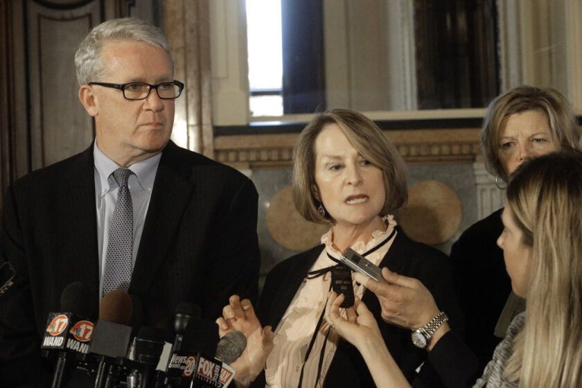 Illinois House Minority Leader Jim Durkin, R-Western Springs, left, and Illinois Senate Minority Leader Christine Radogno, R-Lemont, right, speaks to reporters outside Illinois Gov. Bruce Rauner’s office during veto session at the Illinois State Capitol W