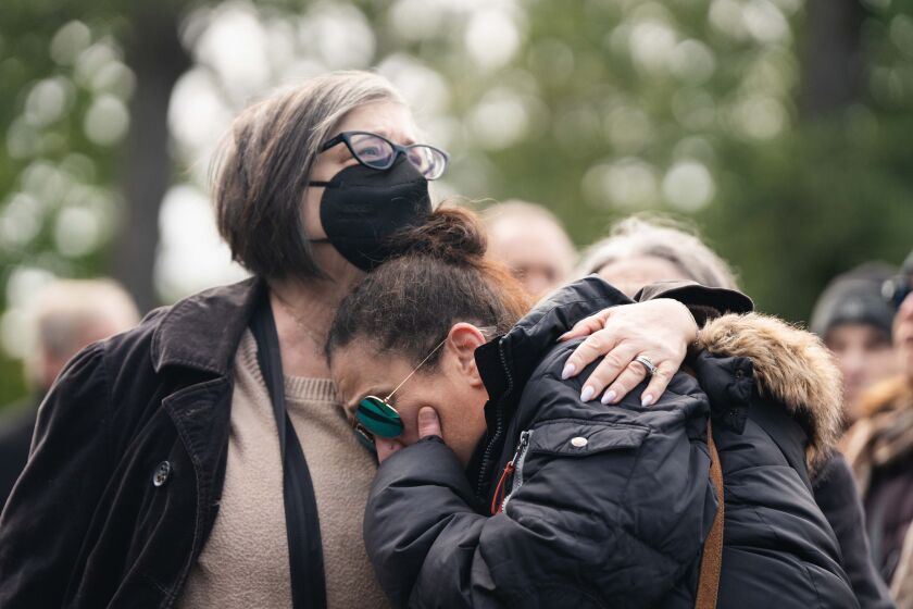 Attendees comfort each other during Jewish United Fund’s event to support Israel outside North Shore Congregation Israel in Glencoe, Ill., Tuesday, Oct. 10, 2023. Politicians like Gov. Pritzker and U.S. Rep. Brad Schneider along with Jewish leaders prayed for Israel, which was attacked by Hamas militants and has killed more than 900 people. | Pat Nabong/Sun-Times