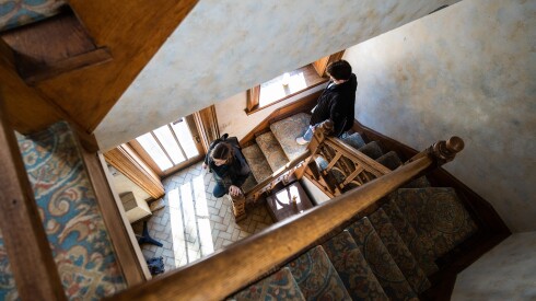 People tour the Givins Castle, located at 10255 S. Seeley Ave. in the Beverly neighborhood and is home to the Beverly Unitarian Church, during Open House Chicago, Saturday, Oct. 15, 2022. The Givins Castle, also called the “Irish Castle,” was Robert C. Givins’ gift to his wife, according to Open House Chicago.