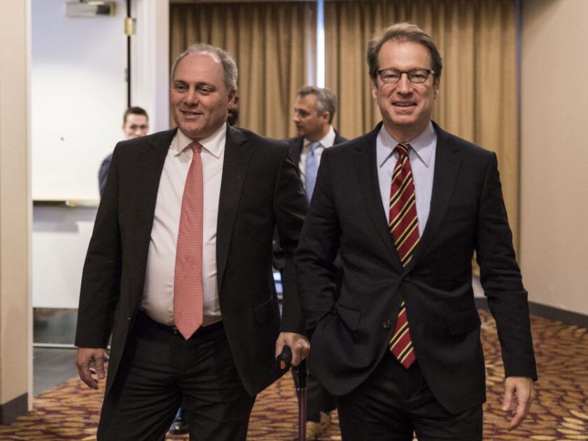 House Majority Whip Steve Scalise, left, and Rep. Peter Roskam talked to reporters before a reception for Roskam Wednesday. | Rich Hein/Sun-Times
