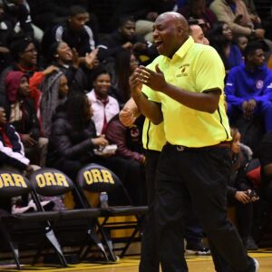 Orr coach Louis Adams cheers after his team goes up by 10 points. Worsom Robinson/For the Sun-Times.