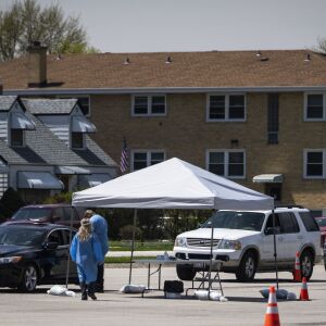 Simple Laboratories phlebotomists last week set up a drive-thru operation in the parking lot of St. Rosalie Catholic Parish in Harwood Heights to draw blood and collect swab samples for coronavirus testing.