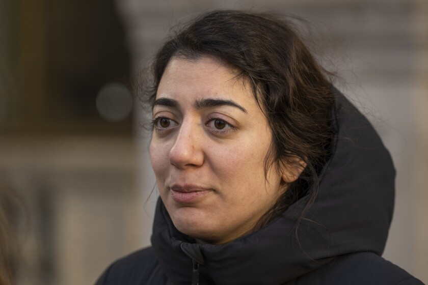 Negar Zadh speaks to reporters Tuesday in the Loop just before Iran and the U.S. agreed to a two-week ceasefire agreement. The 32-year-old hasn't been able to reach her father who lives in Tehran in three weeks. | Tyler Pasciak LaRiviere/Sun-Times