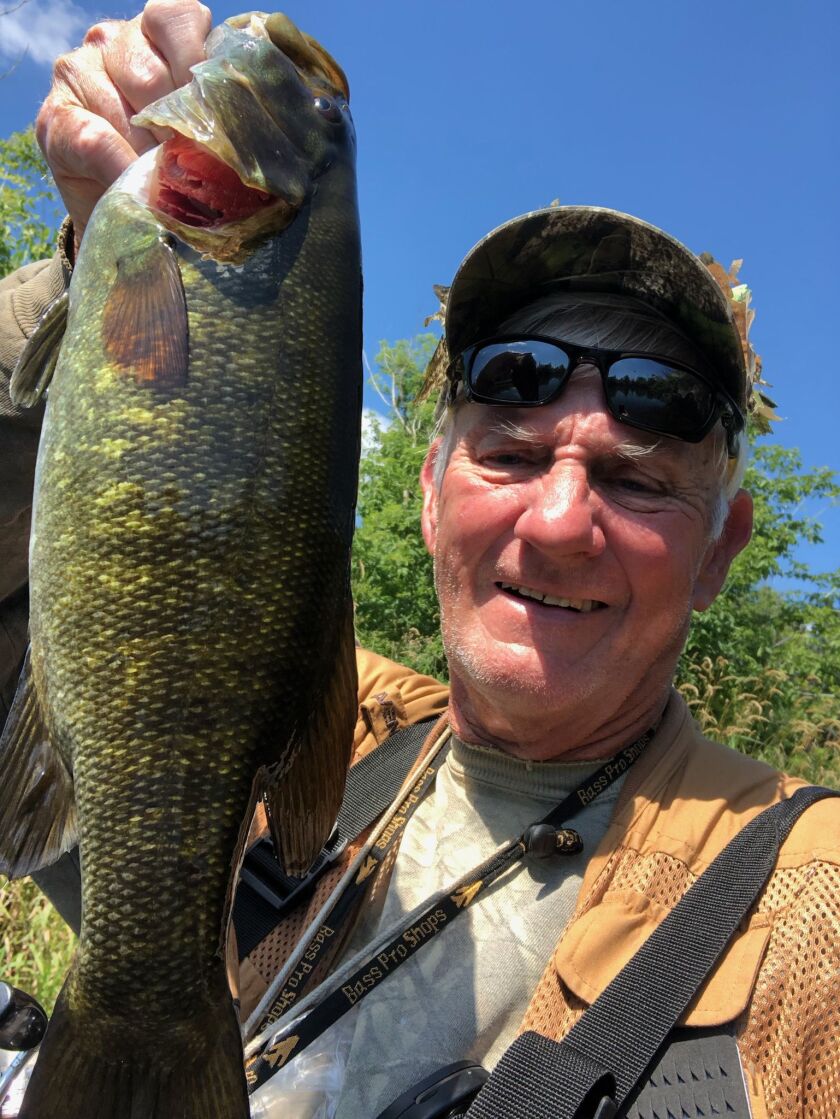 George Peters with a good smallmouth bass from the Kankakee River. Provided photo