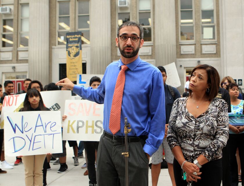 State Rep. Will Guzzardi, D-Chicago, said outside factors contributed to the lower enrollment at Kelvyn Park High School and forced CPS into budget cuts at the school. To his left is state Sen. Iris Martinez, D-Chicago. | Kevin Tanaka/For the Sun-Times